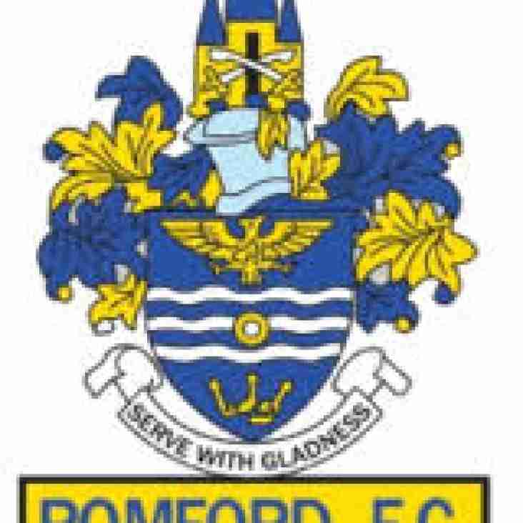 Romford sign National League midfielder